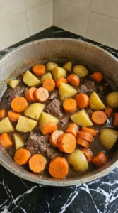 Orange carrots and Yukon gold potatoes added to Irish Beef Stew