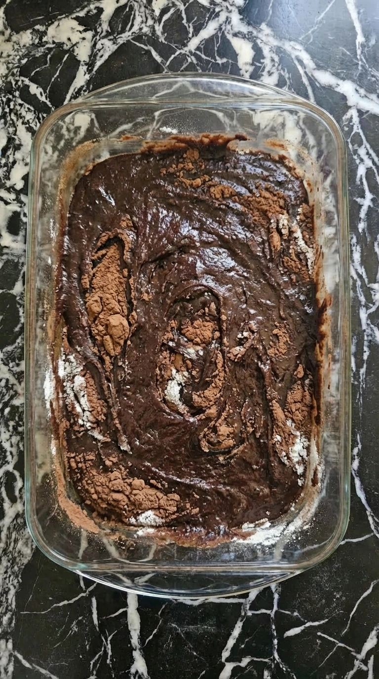 Dry ingredients mixed into brownie batter