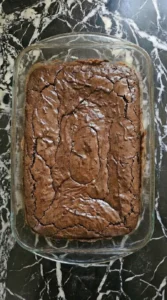 Baked fudgy brownies with cracked top