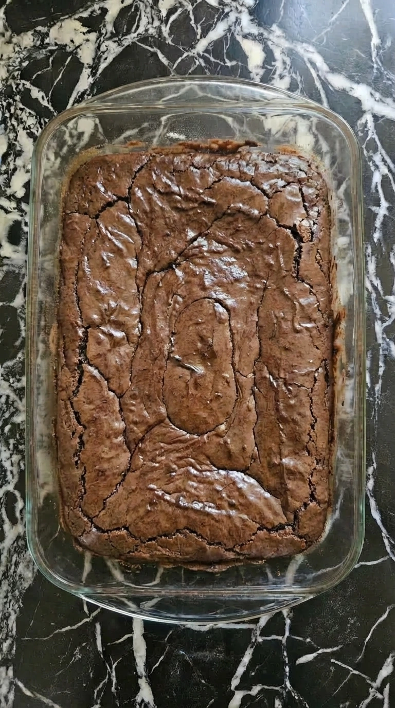 Baked fudgy brownies with cracked top