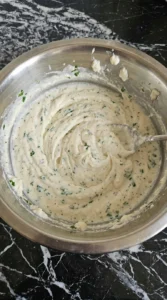 Ricotta filling mixed for Baked Ziti Recipe.