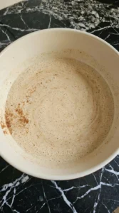 Smooth cinnamon custard for Brioche French Toast in a bowl