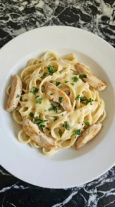 Plated Creamy Chicken Alfredo Pasta ready to serve
