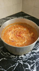 Creamy tomato sauce simmering with crushed San Marzano tomatoes and heavy cream.
