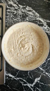 Thick batter for High Protein Pancakes in a mixing bowl.