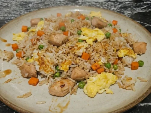 Homemade chicken fried rice with vegetables and egg