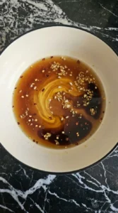 Honey garlic sauce mixed with garlic and soy for Honey Garlic Chicken.