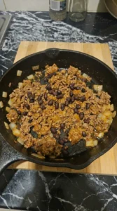 Seasoned beef and black beans for Loaded Nachos Recipe