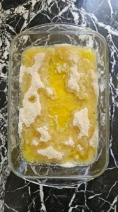 Butter and sugar partially mixed for brownies