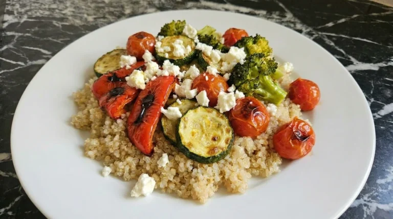 Quinoa Veggie Bowl with roasted vegetables and feta