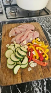 Sliced chicken and vegetables