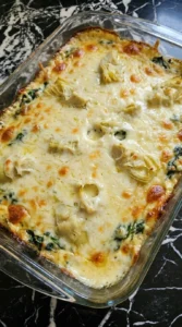 Spinach Artichoke Dip baked until bubbly with golden cheese.
