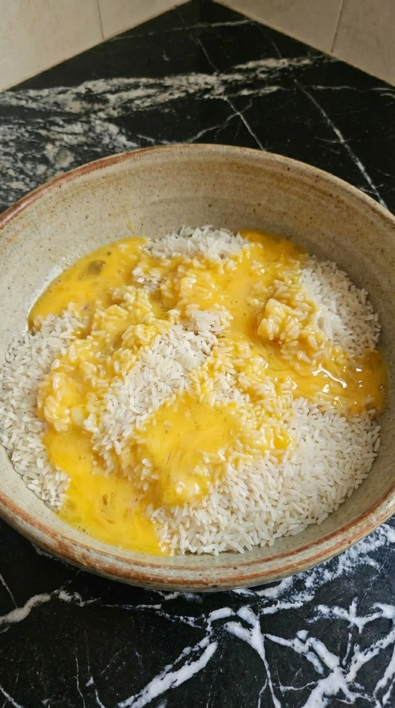 Eggs poured over rice