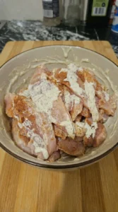 chicken coated in creamy garlic sauce