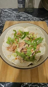 wrap filling placed unevenly on tortillas