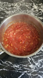 simmering tomato sauce