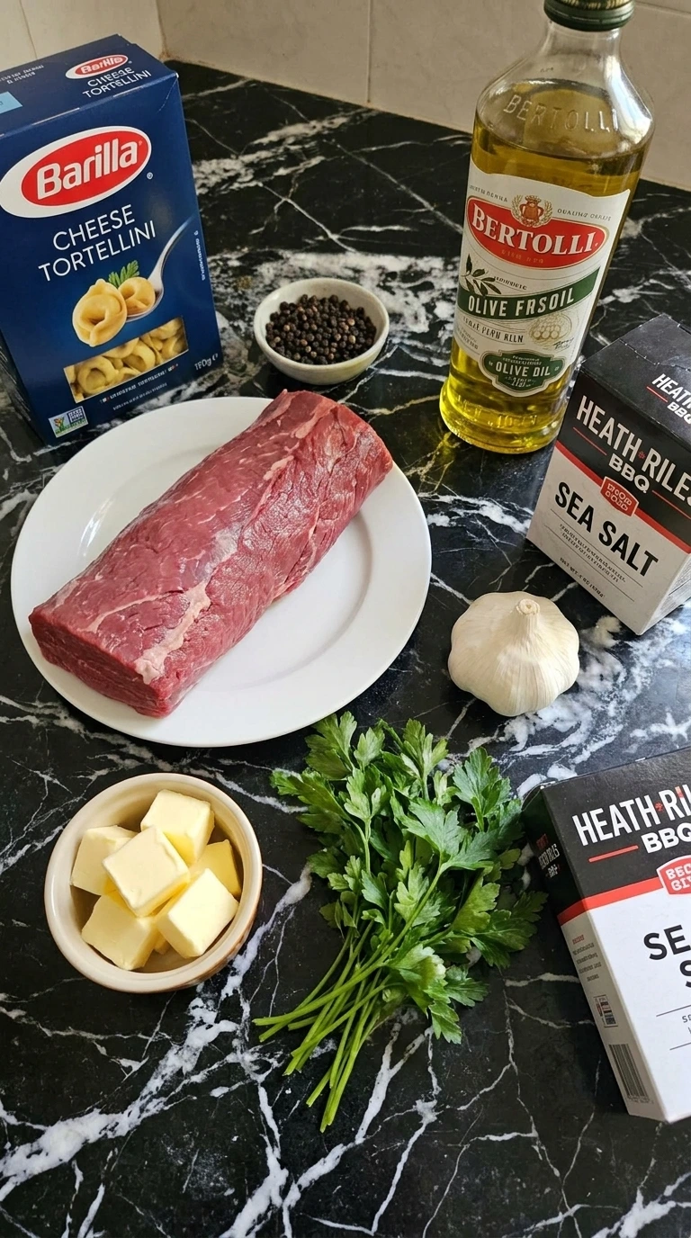 Raw ingredients for steak with garlic butter scattered on marble