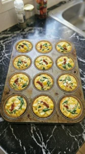 Golden baked Patty Pan Squash Egg Muffins with set centers and browned edges.