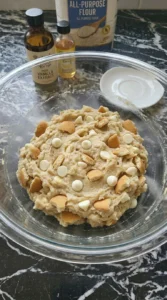 Thick banana pudding cookie dough with white chocolate chips and vanilla wafers