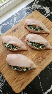 Four chicken breasts filled with goat cheese spinach and figs