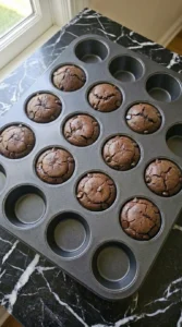 Banana Brownie Bites baked with fine cracked tops and set dark cocoa edges