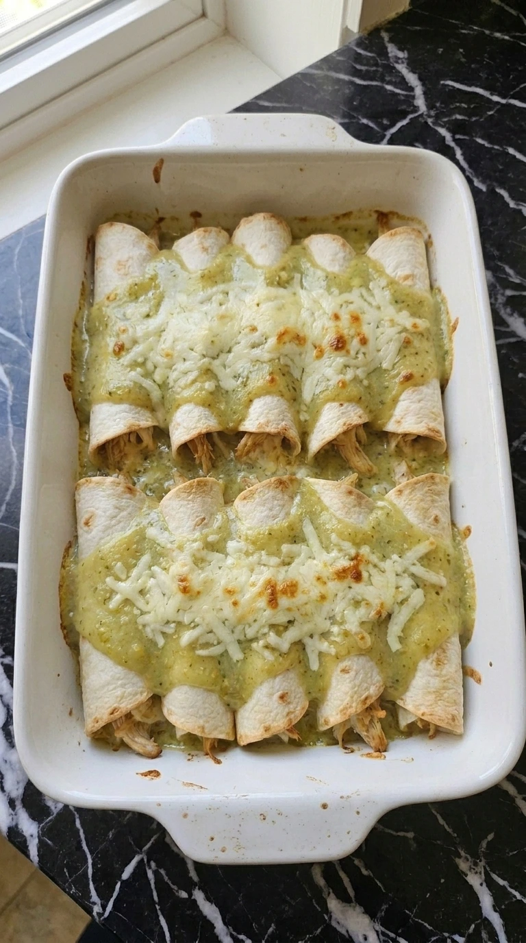 Baked Creamy Hatch Green Chile Chicken Enchiladas with golden melted cheese