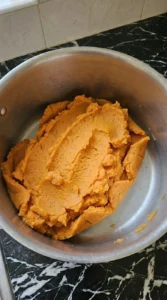 Roughly mashed sweet potatoes for Maple Sweet Potato Mash with visible ridges