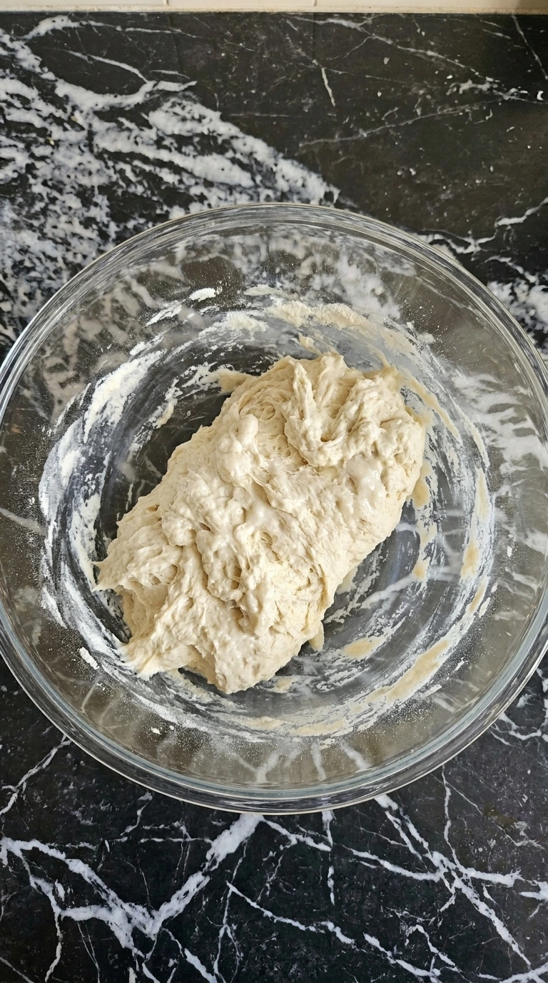 Neapolitan Pizza Dough Recipe (Easy Authentic Napoli-Style Crust) step 1 showing a shaggy flour and water dough