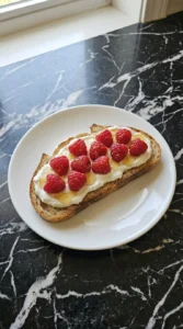 Toasting sourdough bread for Raspberry Yogurt Toast