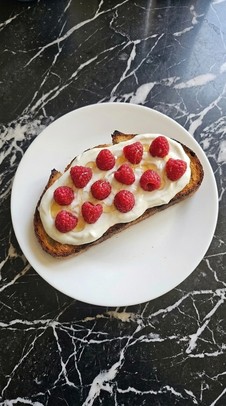 Whipping Greek yogurt and honey for Raspberry Yogurt Toast