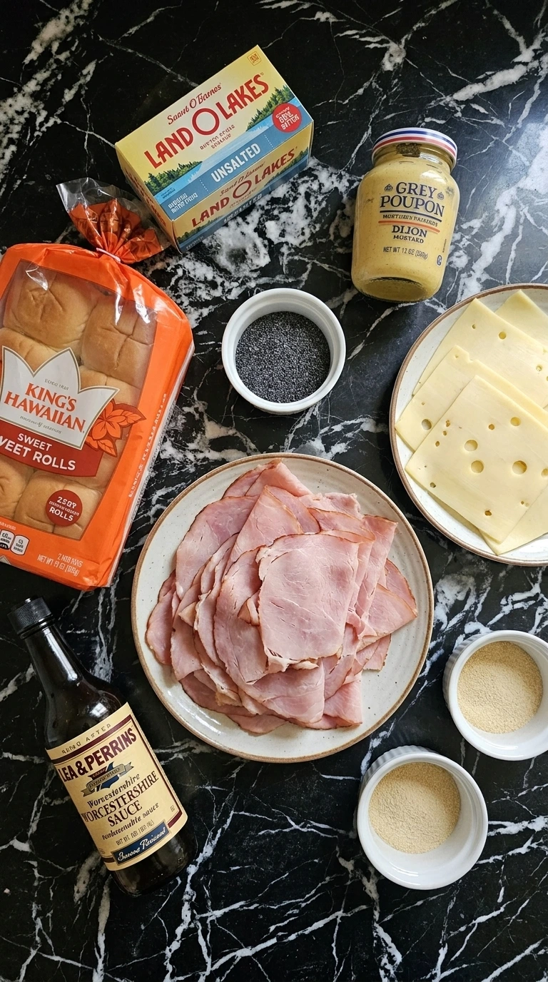Ingredients for Sassy Tailgate Sandwiches: Hot Ham and Cheese Sliders for Game Day arranged on table Recipe focus: Sassy Tailgate Sliders.