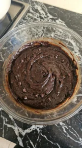 Thick cocoa sweet potato brownie batter with dark chocolate chips.