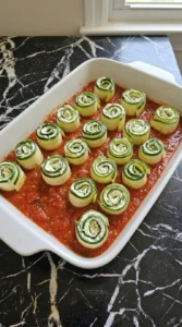 Ricotta and herb filling mixed in a glass bowl for Zucchini Roll-Ups