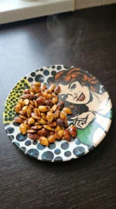 Finished Cinnamon Sugar Roasted Pumpkin Seeds cooled until crisp with a crackly caramelized coating