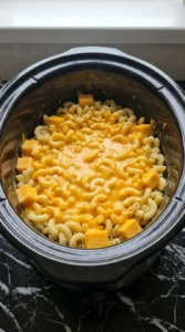 Crockpot Mac and Cheese Velveeta cheese sauce coating macaroni Recipe focus: easy lunch ideas.