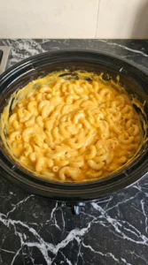 Crockpot Mac and Cheese Velveeta finished creamy macaroni texture Recipe focus: crock pot macaroni and cheese.
