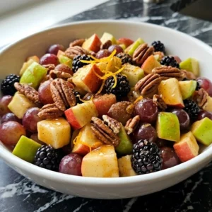 Fall Fruit Salad Thanksgiving Sides with apple cubes grapes blackberries and pecans