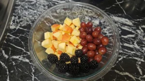 Fall Fruit Salad Thanksgiving Sides fresh apple cubes grapes and blackberries