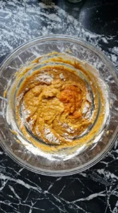 Friendsgiving Cake batter mixing with pumpkin and warm spices Recipe focus: friendsgiving dish ideas.