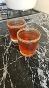Friendsgiving Cocktails chilled glasses with cinnamon sugar rims Recipe focus: thanksgiving drink ideas.
