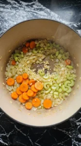 Softening carrots, celery and onion for Gluten Free Chicken Noodle Soup