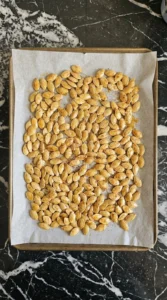 Honey Roasted Pumpkin Seeds coated in glossy honey spice glaze before roasting Recipe focus: roasted nuts recipe.
