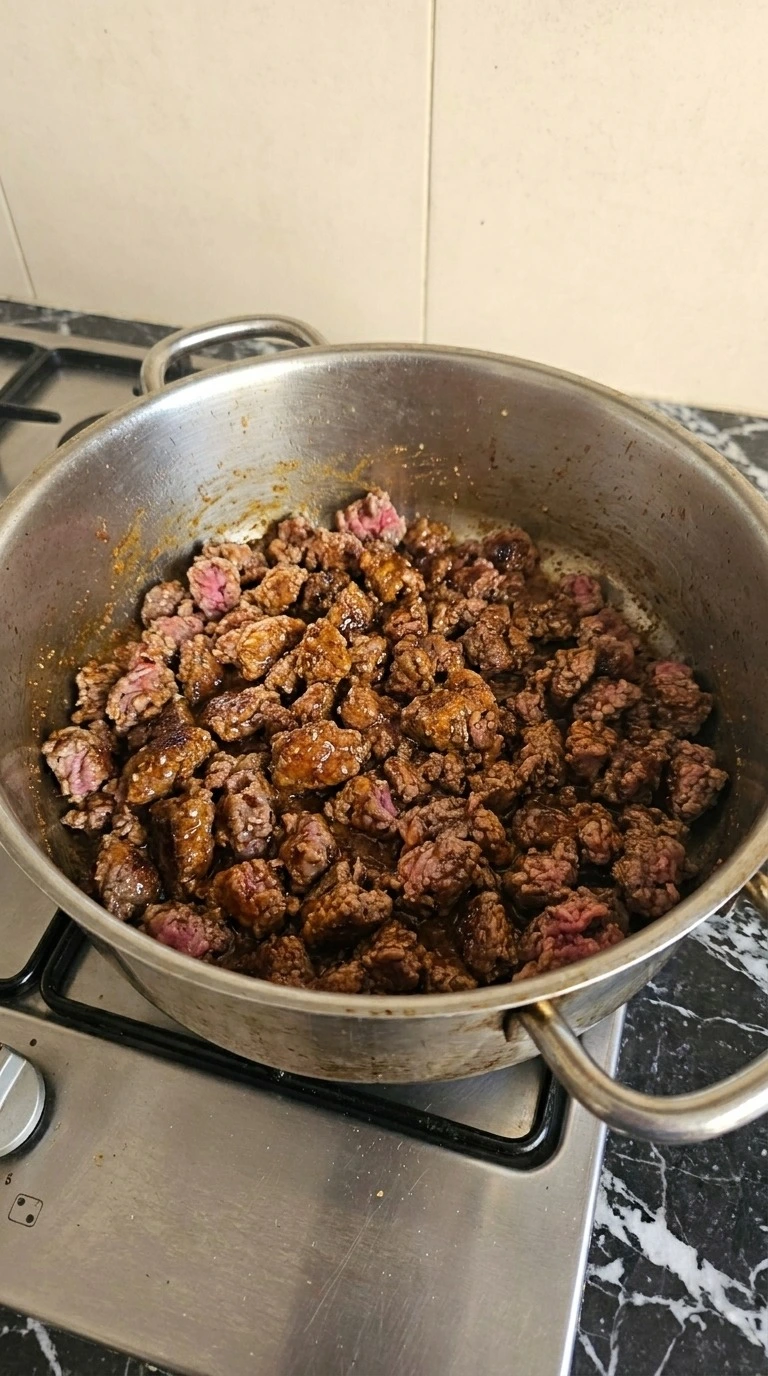 7 Can Taco Soup browning ground beef with taco seasoning in pot Recipe focus: taco soup recipe easy.