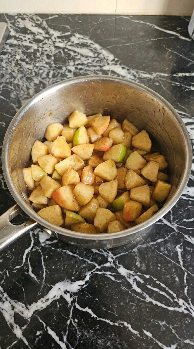Apple Crisp Cheesecake step with tender cinnamon Honeycrisp and Granny Smith apples Recipe focus: apple cream cheese dessert.