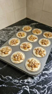 Baked Apple Crisp Mini Cheesecake cups with cinnamon apples and golden oat crumble Recipe focus: mini apple crisp cheesecake.