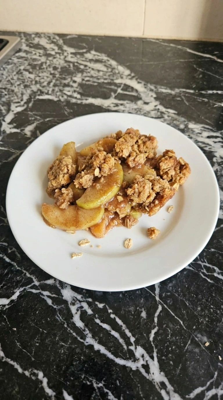 Apple Crisp with Oatmeal Crumble step 5: rest and serve one portion with visible texture changes Recipe focus: quick apple crisp.