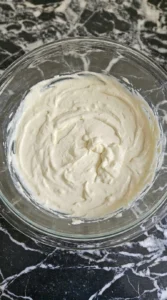 Whipped cream cheese filling for Carmel Apple Trifle Fall Desserts with soft smooth ridges