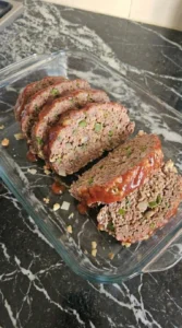 Cracker Barrel Meatloaf sliced after resting with tender center Recipe focus: best meatloaf recipes.