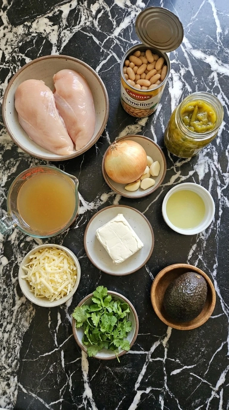 Crockpot White Chicken Chili ingredients with chicken beans spices and vegetables Recipe focus: chicken chili crockpot.