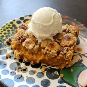 Dump Cake Pumpkin Fall Desserts with golden pecan crumble and vanilla bean ice cream Recipe focus: dump cake recipes pumpkin fall desserts.